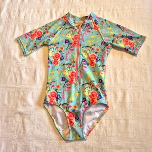 Tame the Sun girls size 9 ruffle tush 1 piece short sleeve UPF 50+ swim suit EUC